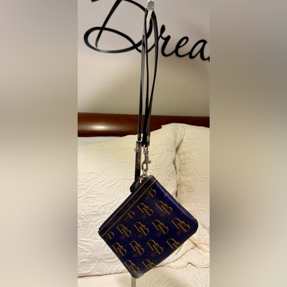 Gently Used Dooney & Bourke Blue and Gold Wristlet - Picture 2 of 3